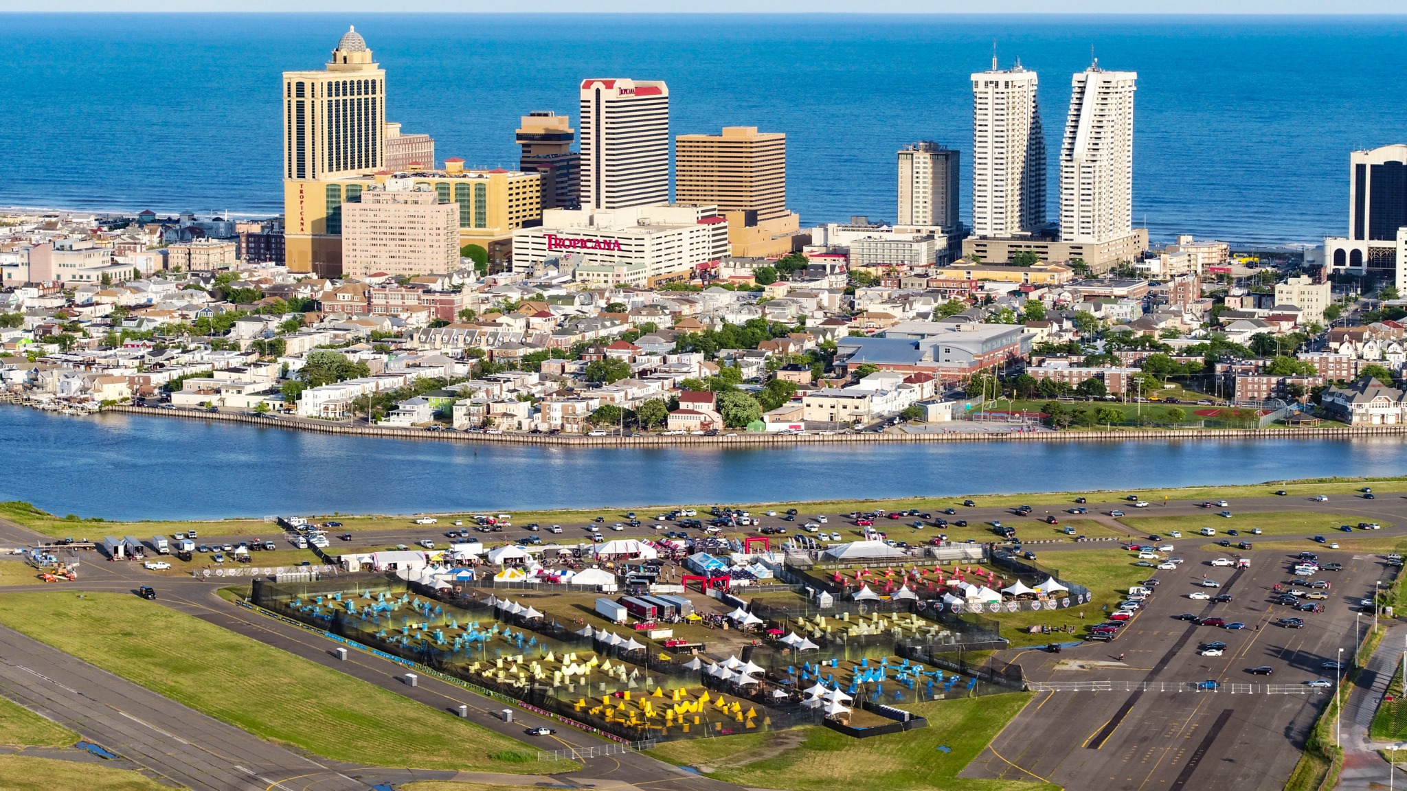 Aerial view of an outdoor event beside Atlantic City, casinos and the ocean