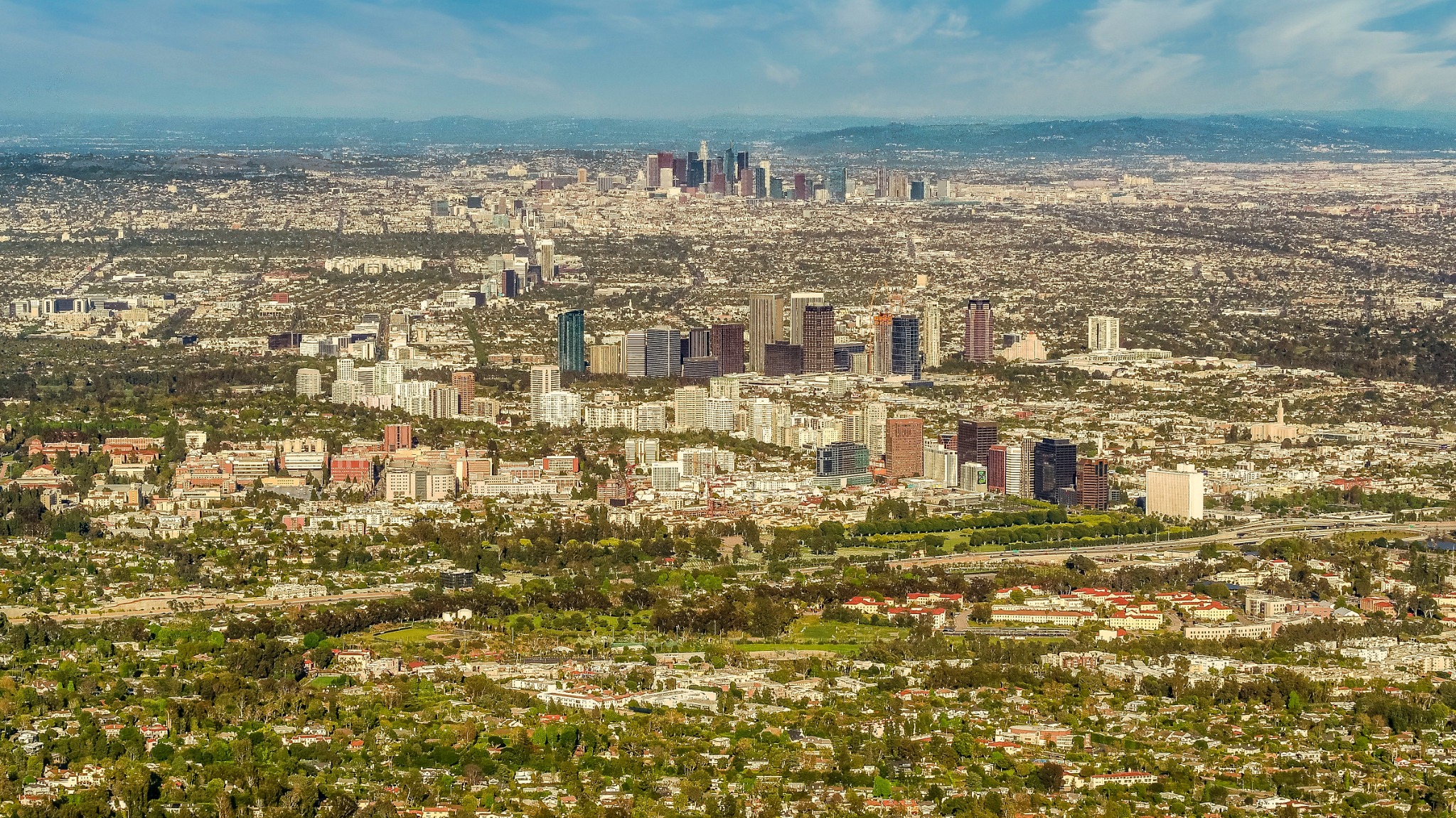 Wide aerial panorama of Los Angeles with downtown in the distance